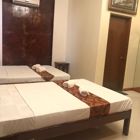 פורטו פרינססה Aquari Travellers Inn מראה חיצוני תמונה