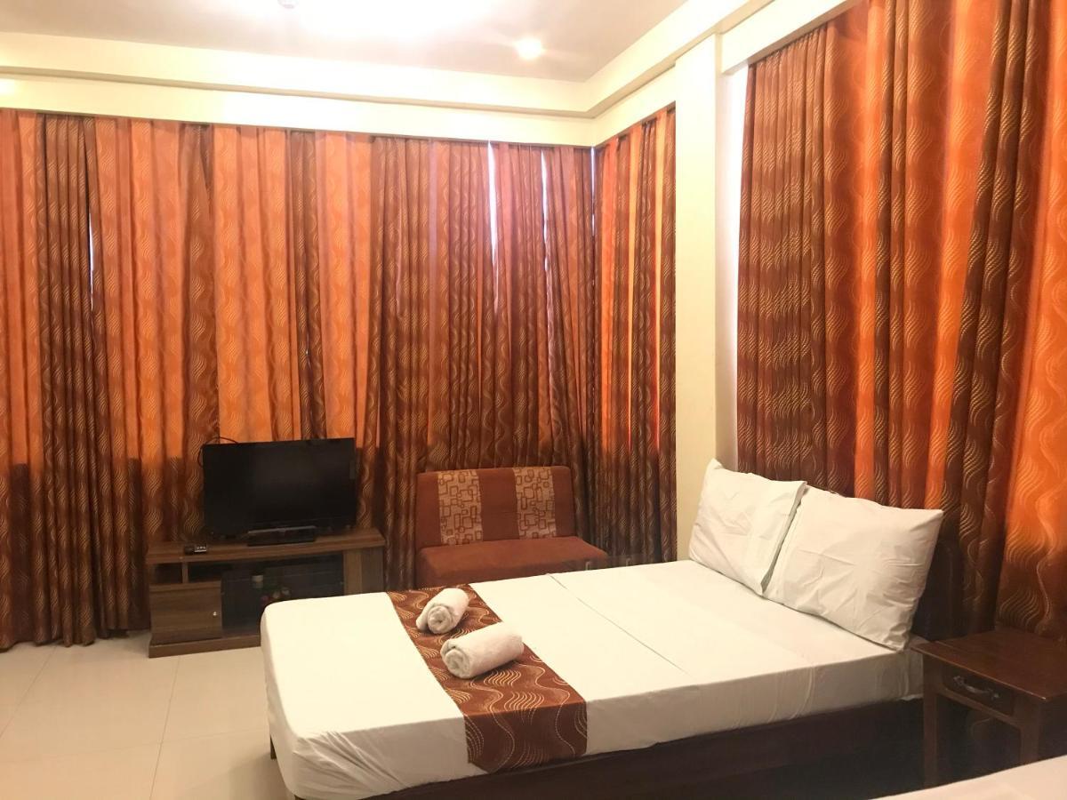 פורטו פרינססה Aquari Travellers Inn מראה חיצוני תמונה