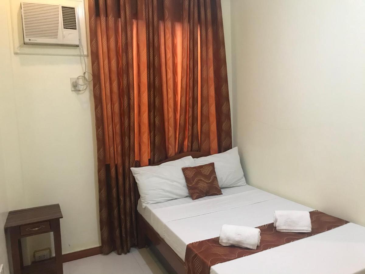 פורטו פרינססה Aquari Travellers Inn מראה חיצוני תמונה
