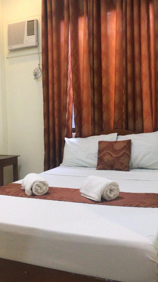 פורטו פרינססה Aquari Travellers Inn מראה חיצוני תמונה
