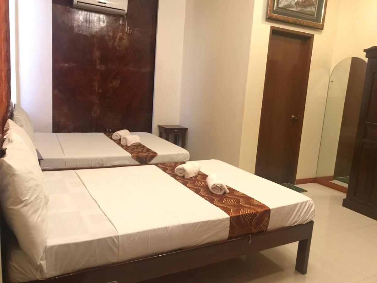 פורטו פרינססה Aquari Travellers Inn מראה חיצוני תמונה