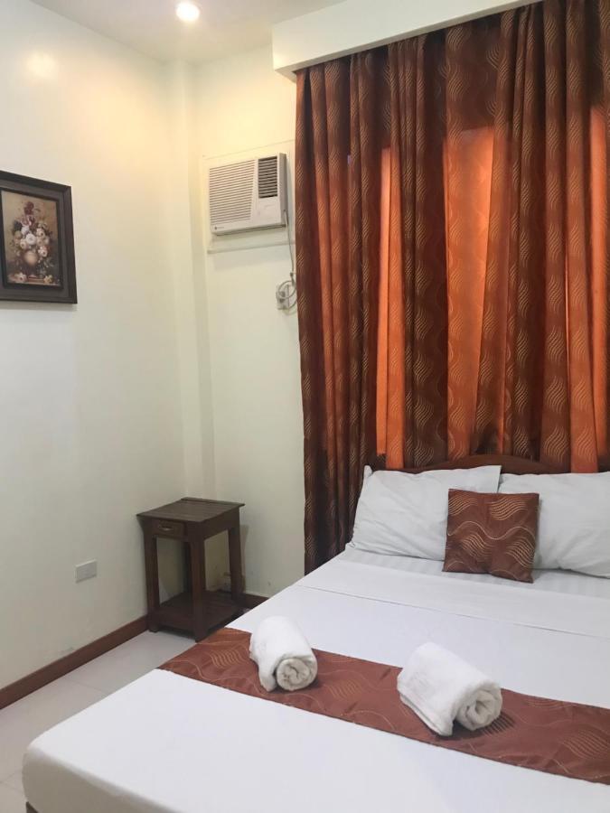 פורטו פרינססה Aquari Travellers Inn מראה חיצוני תמונה