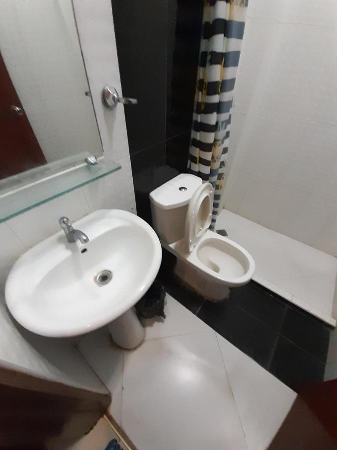 פורטו פרינססה Aquari Travellers Inn מראה חיצוני תמונה