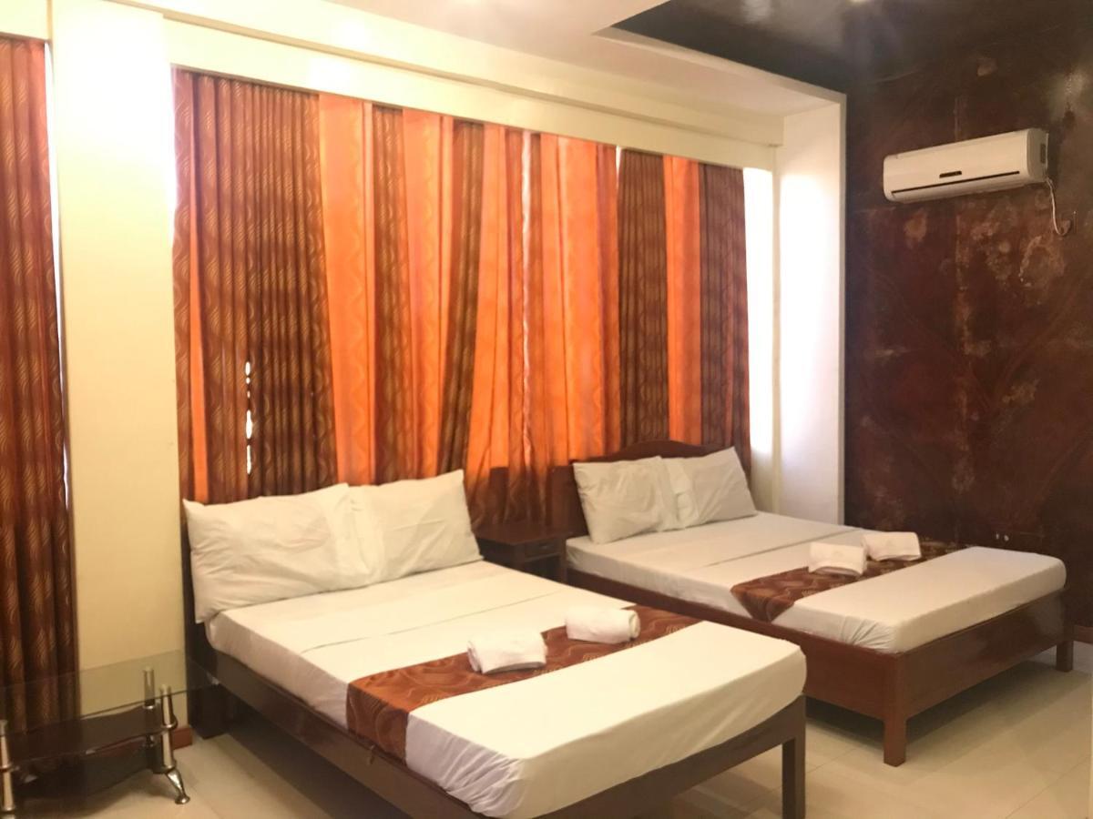 פורטו פרינססה Aquari Travellers Inn מראה חיצוני תמונה