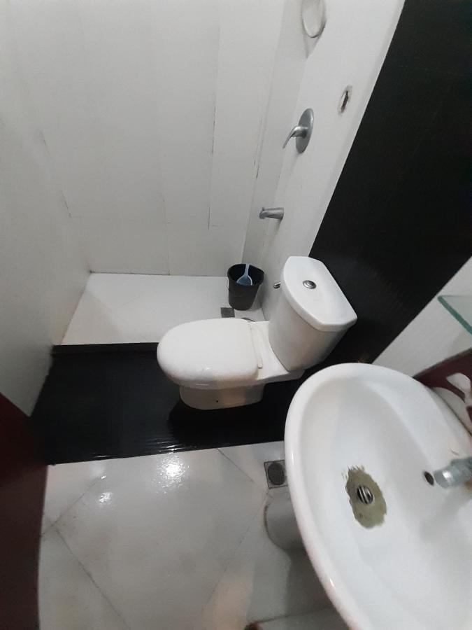 פורטו פרינססה Aquari Travellers Inn מראה חיצוני תמונה